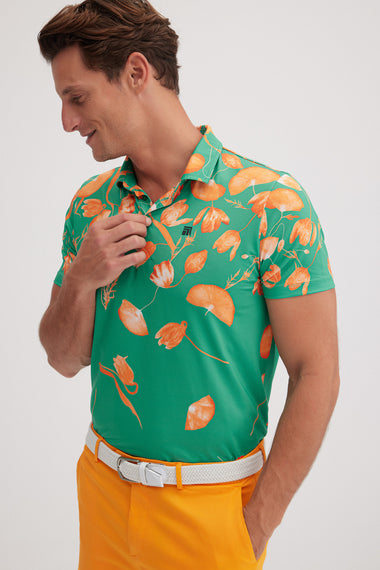 Botanica Golf Polo in Apricot Orange on Mint Green