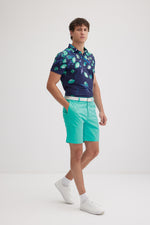 Botanica Golf Polo in Turquoise on Navy